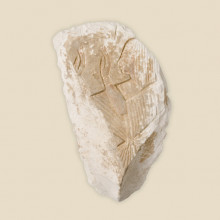 stone frag showing tunic